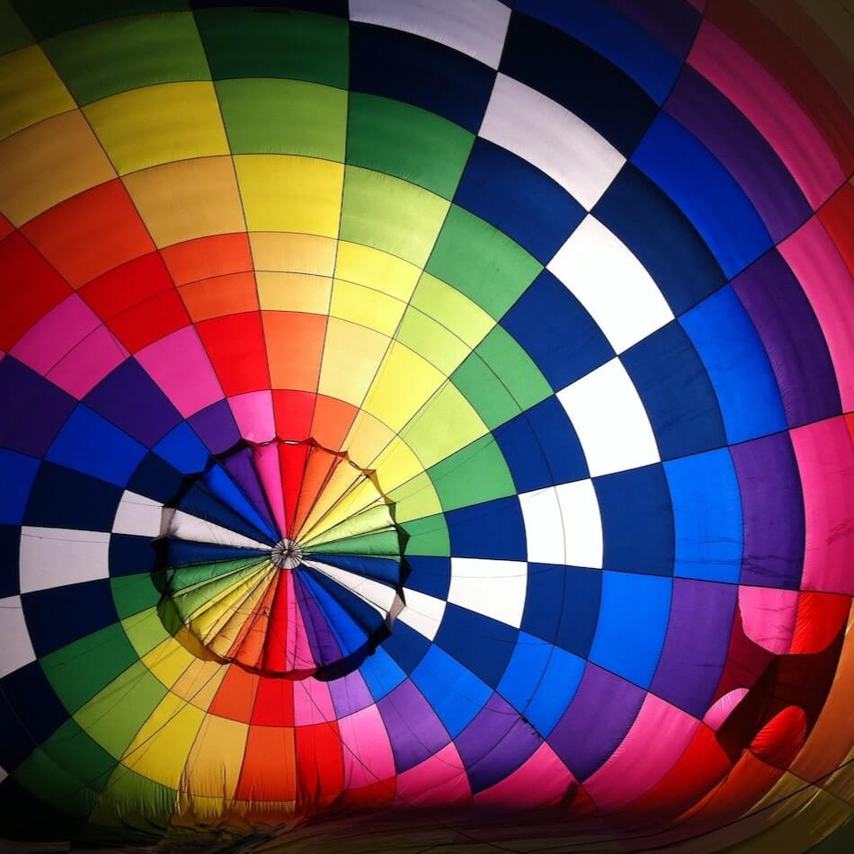 An photo of a multicoloured hot-air-balloon