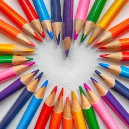 Many colouring pencils of different colours.